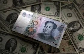 Yuan Strengthens as Central Parity Rate Rises to 7.0602 Against Dollar