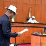 Jerry Otu, Chairman of the Akwa Ibom House of Assembly Committee on Information, speaking at a press briefing in Uyo, addressing a viral social media report falsely claiming the Assembly plans to jail women involved with married men.