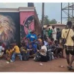 Residents of Akpa-Otobi community in Benue State gather after a deadly early-morning attack that killed four people, including a soldier and a former councillor.