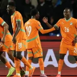 Côte d’Ivoire players celebrating a goal during their 3–0 win over Burkina Faso in Marrakesh.