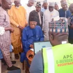 “Senator Abdullahi Adamu revalidates his membership during the APC e-membership registration exercise in Nasarawa State, dispelling rumours of defection.”